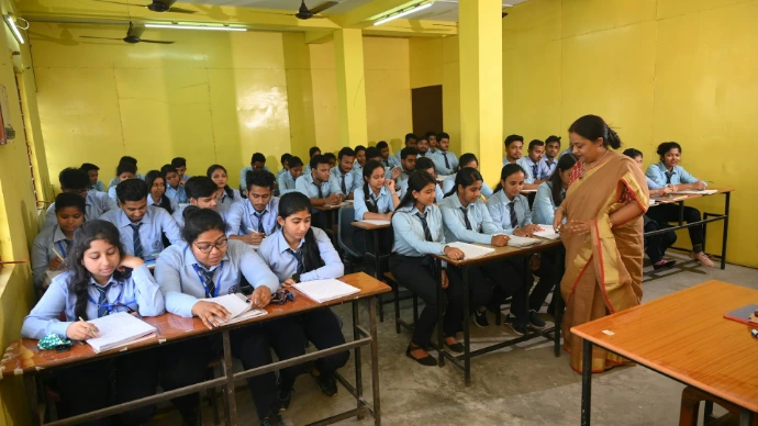 a classroom full of students sitting at desks